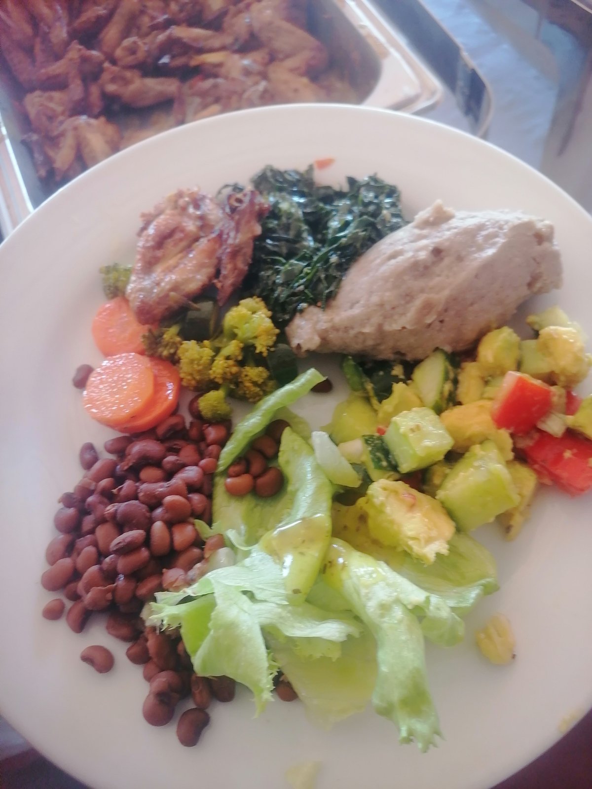 Sadza re Zviyo with Roadrunner Wing, Cowpeas, Eggs, Mixed Fruit and Veg Salad